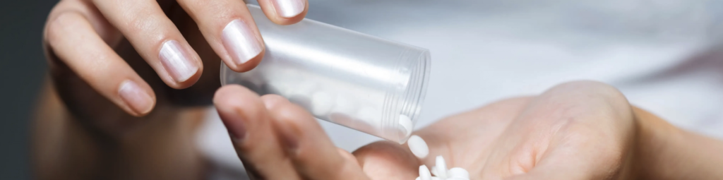 Subutex pills poured into hand.
